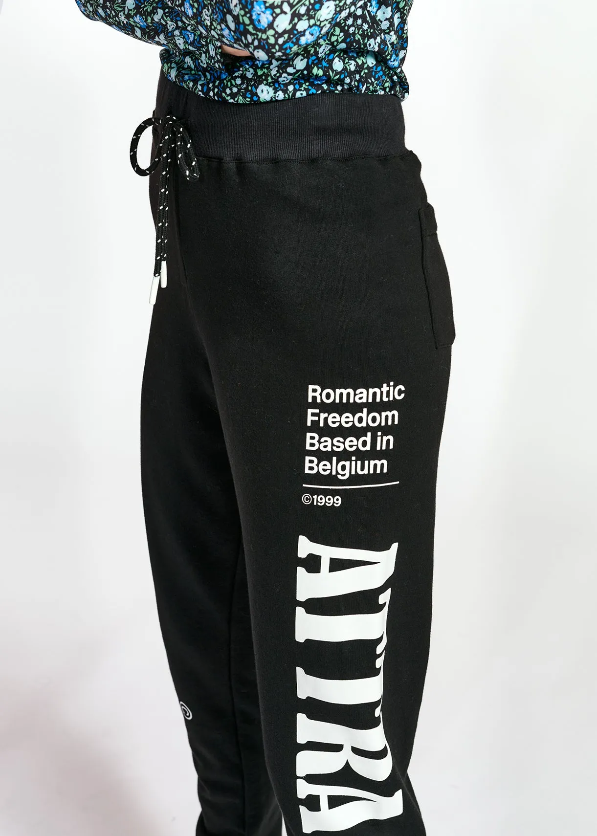 Black jersey track pants with print