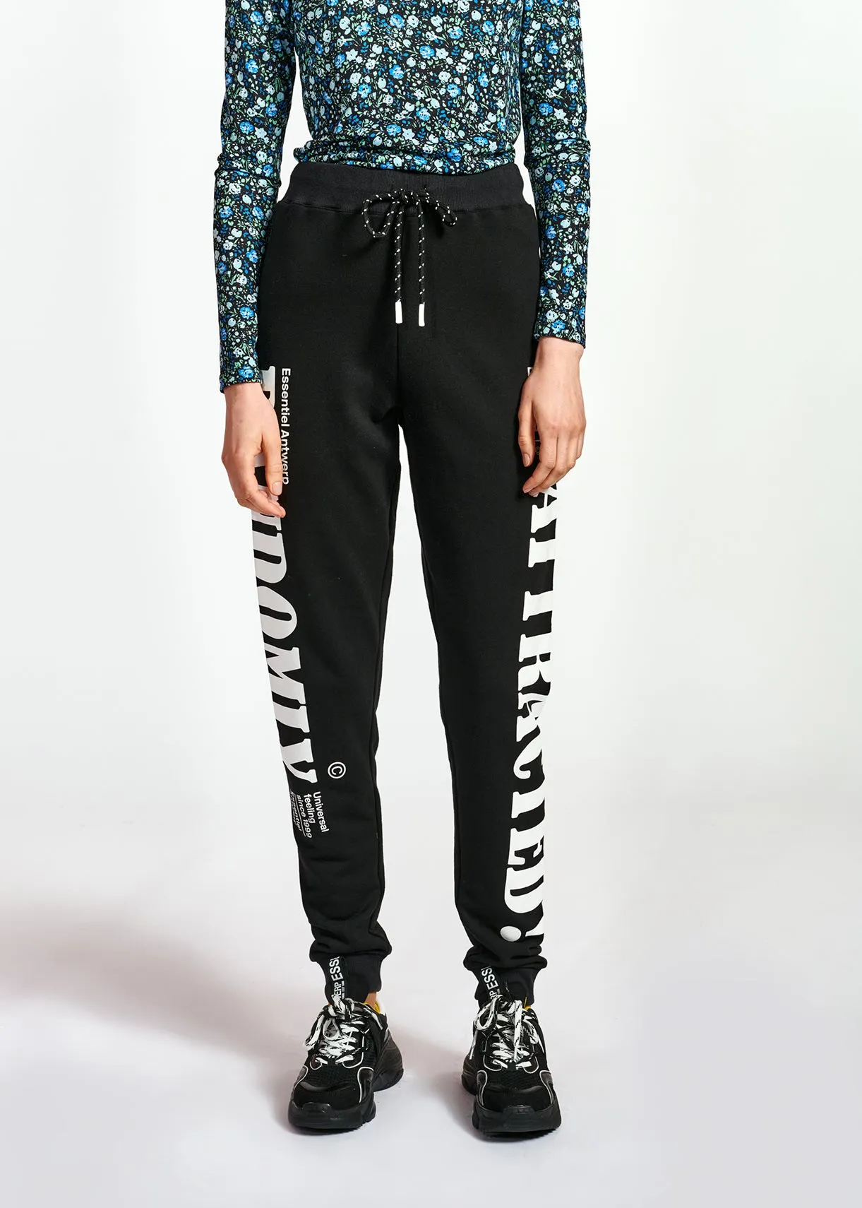 Black jersey track pants with print